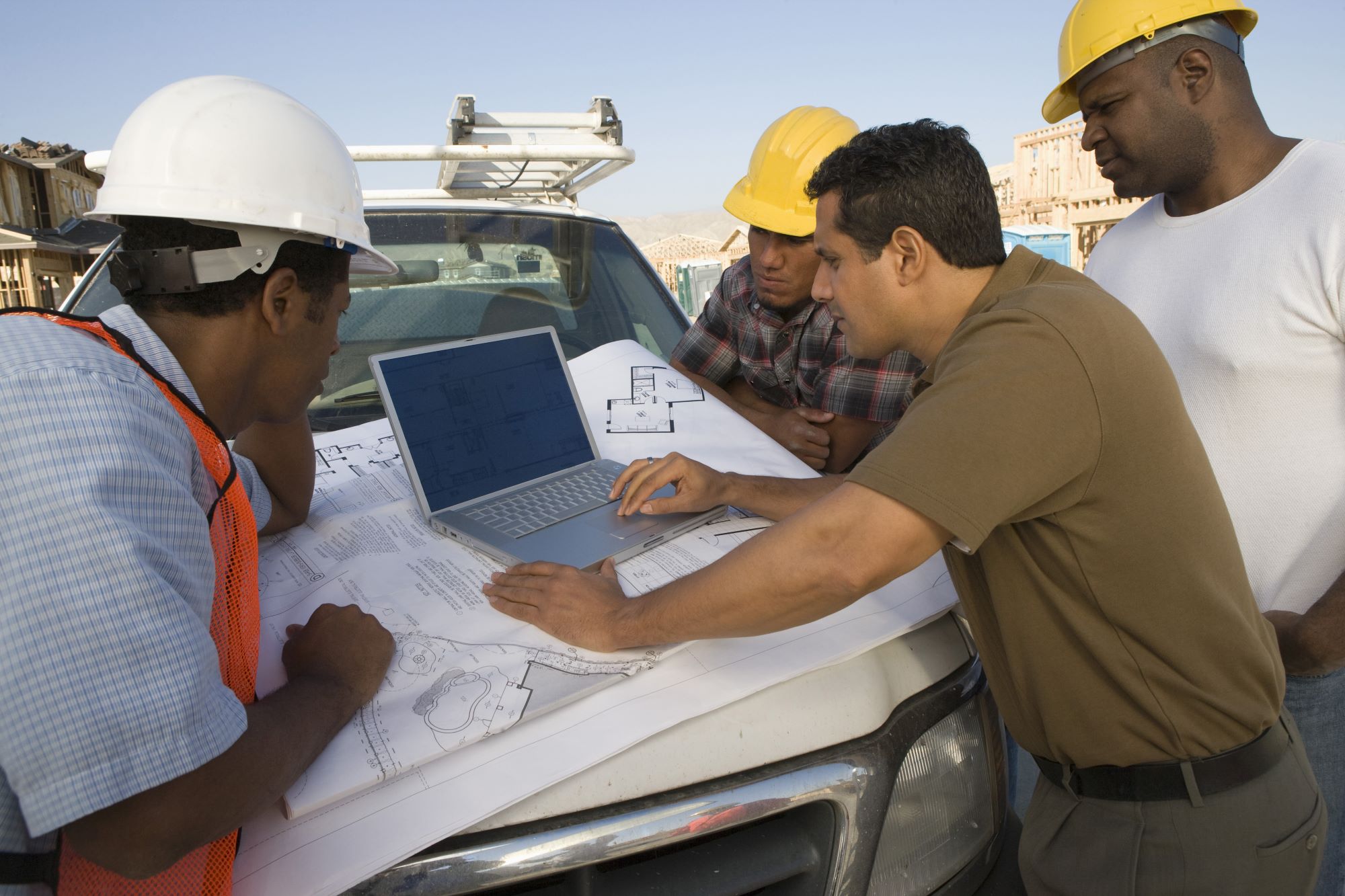 Construction group laptop on site
